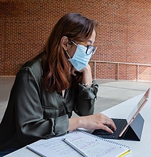 student working on an ipad