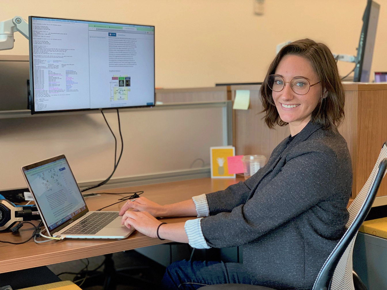 Photo of Theresa Alexander working at her desk