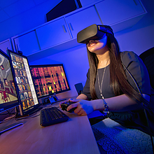 woman using VR headset