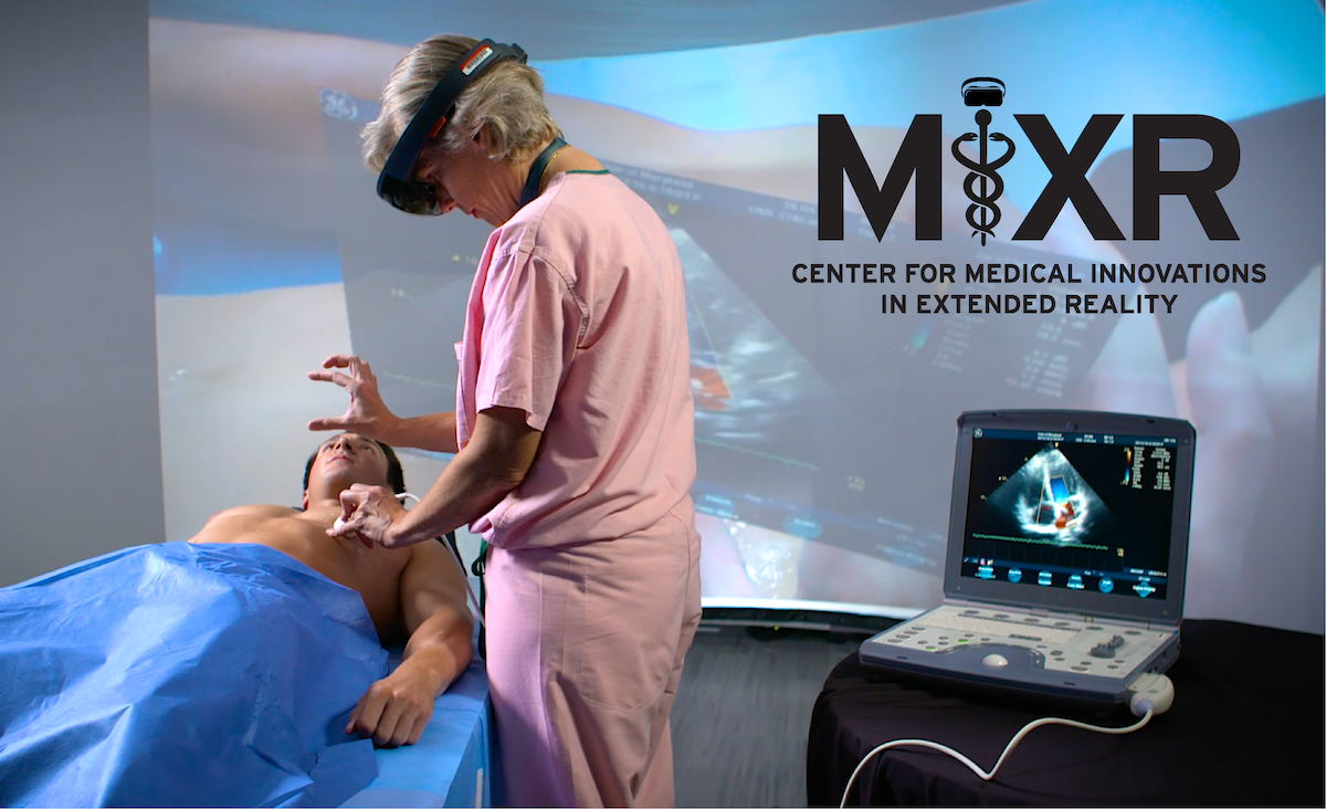 A nurse with a VR headset attending to a patient 