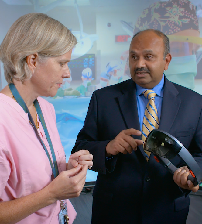 doctor and computer scientist discussing AR headset