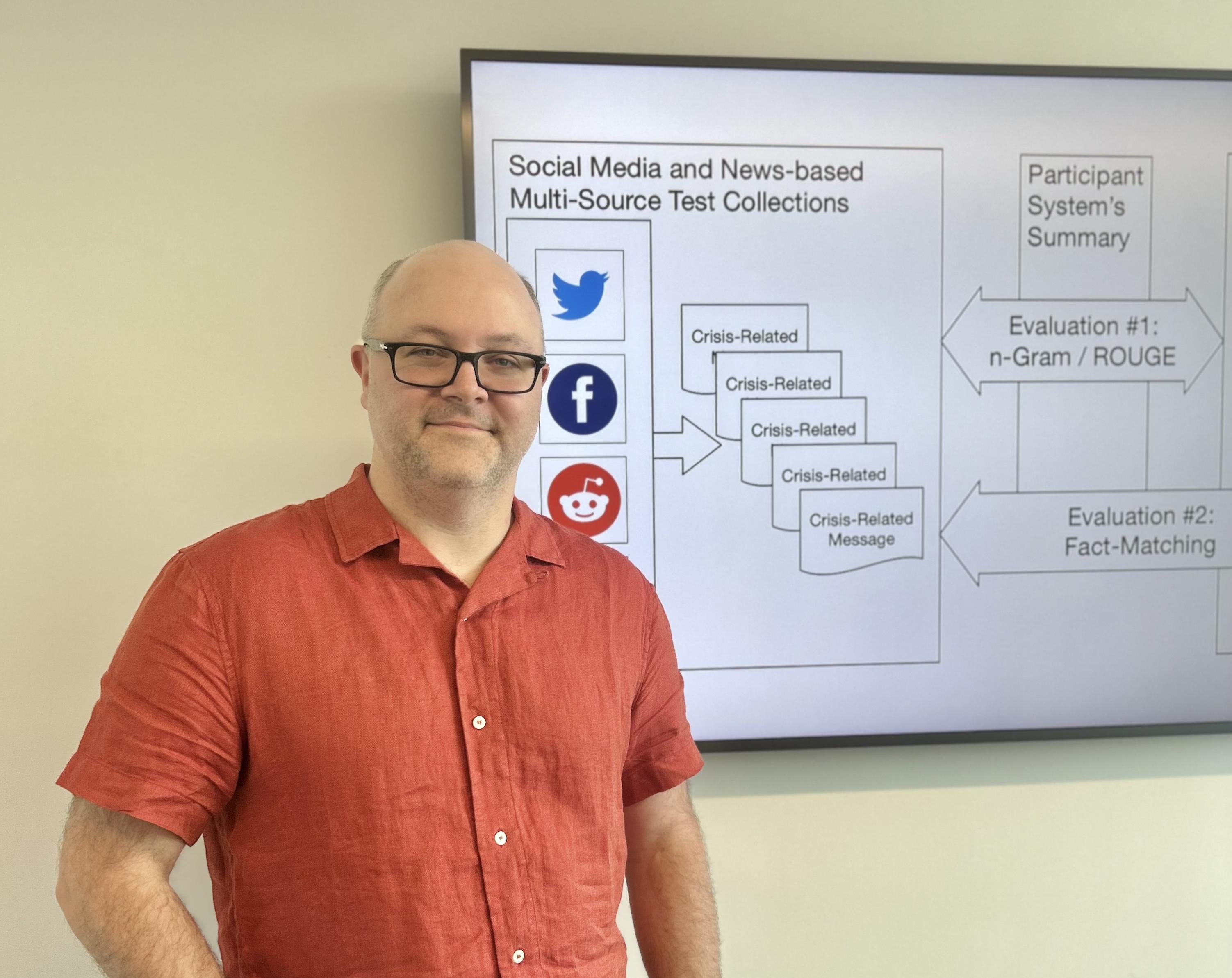 man standing next to social media icons and data