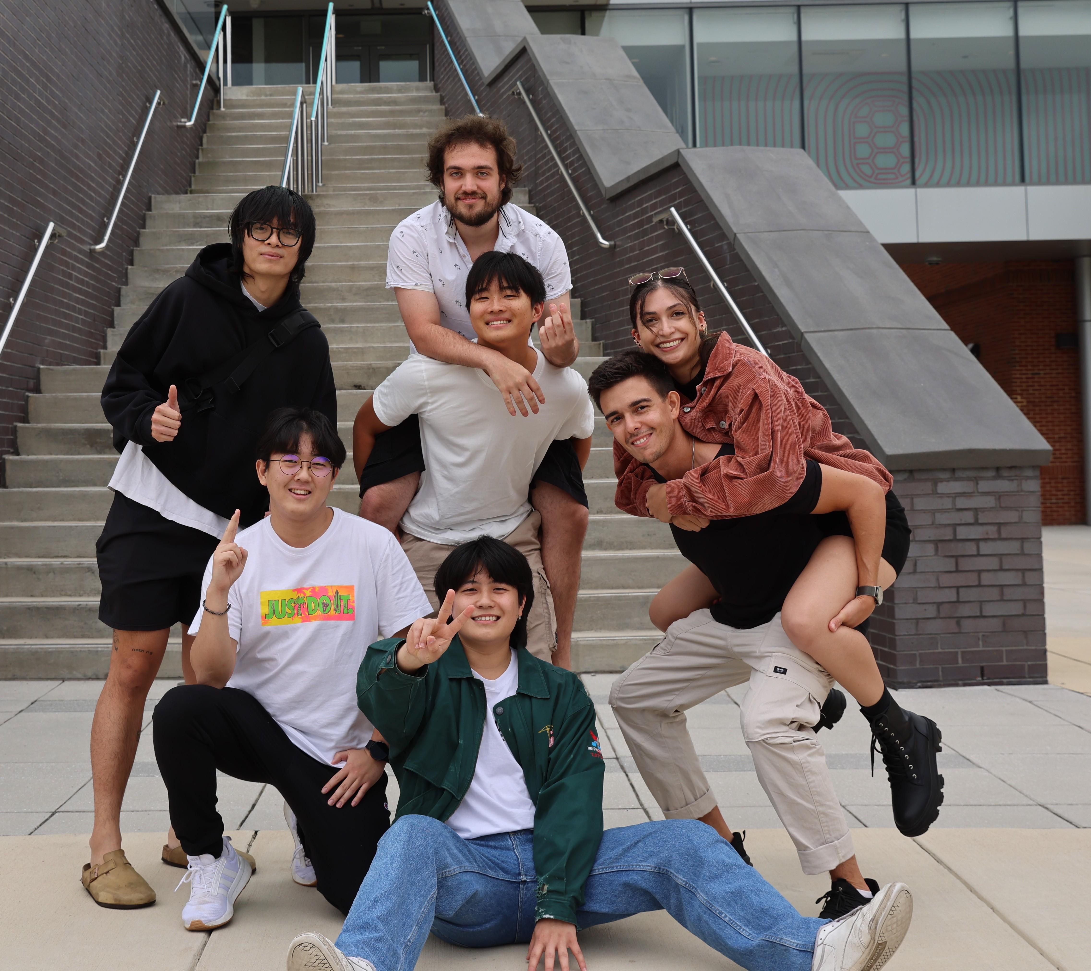 group of seven students posing for camera